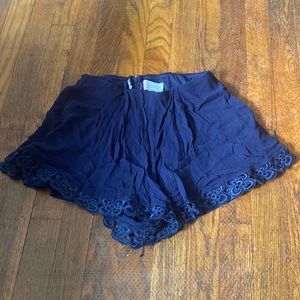 Navy lace mini shorts